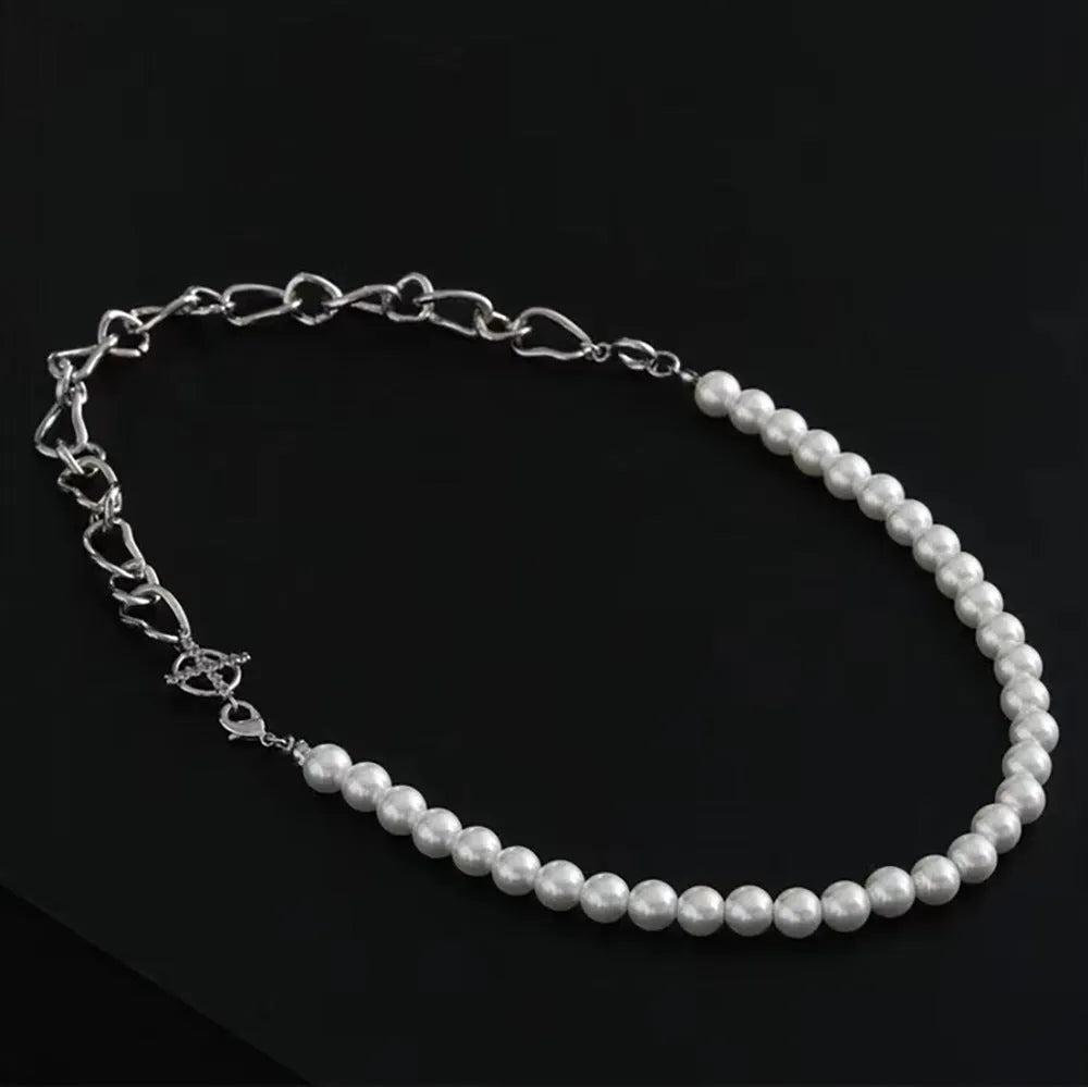 White geometric acrylic asymmetric clavicle chain necklace on a twisted chain.