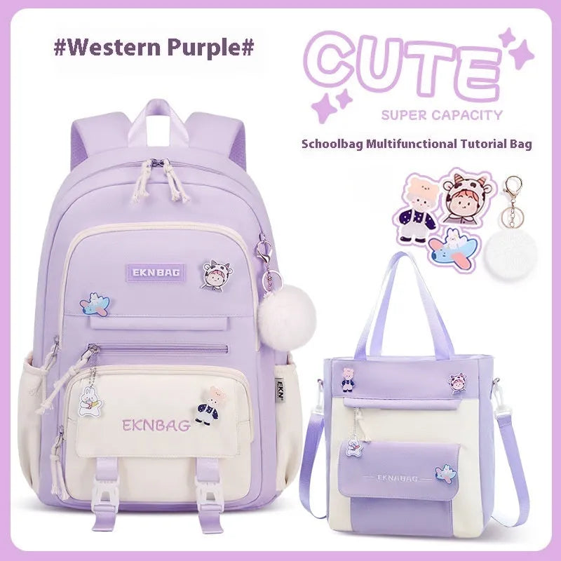 Pink waterproof Oxford cloth school backpack for girls with curved shoulder straps, shown with matching pencil case.