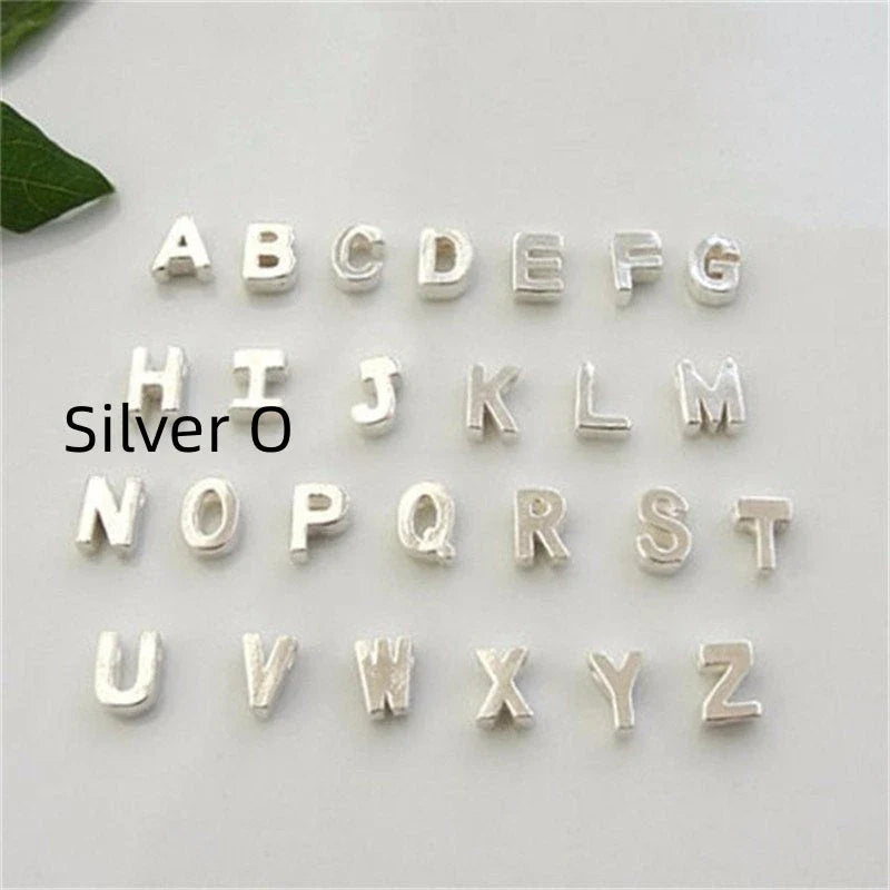 Heart-shaped letter pendant necklace with clavicle chain in various metallic colors