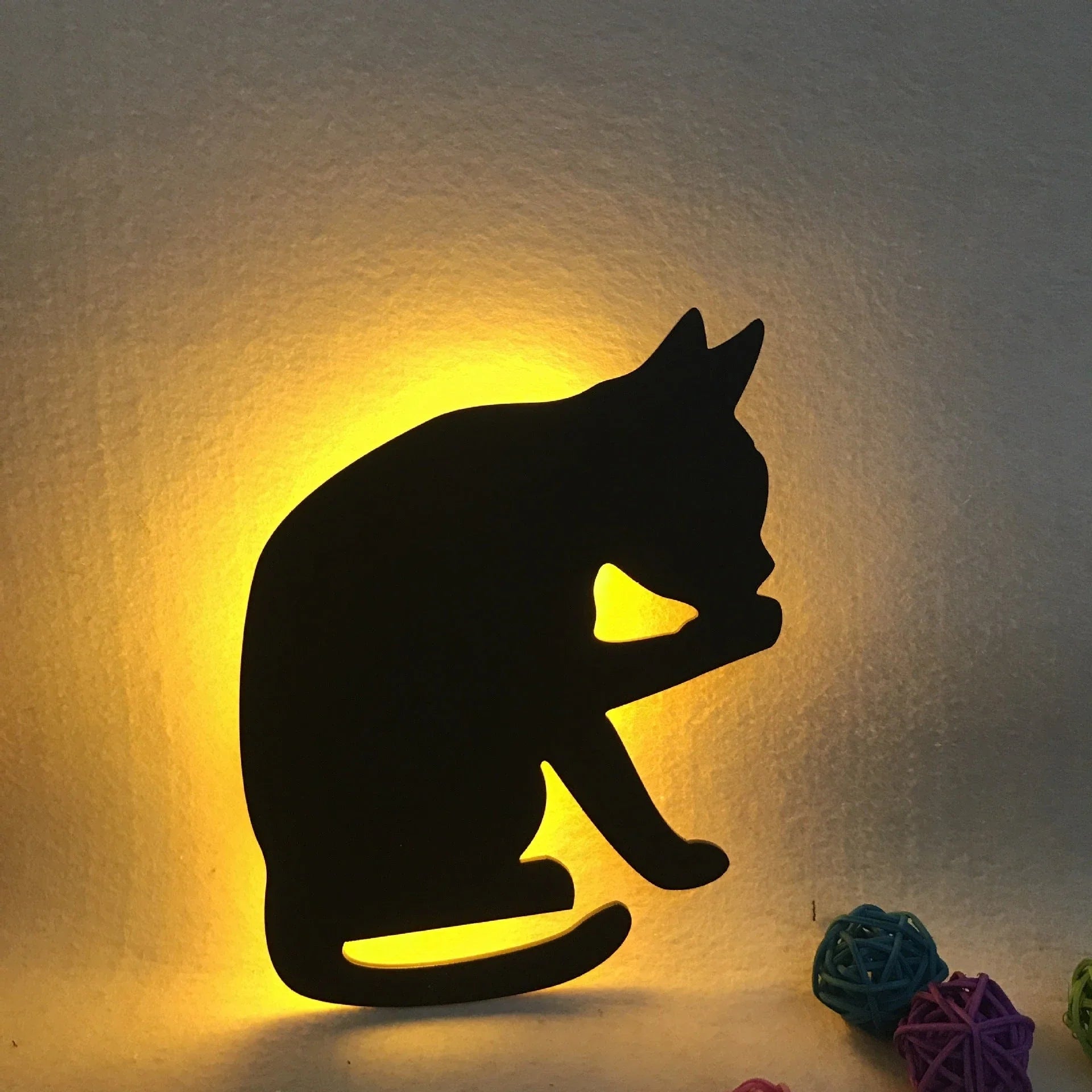 Illuminating pet-themed night light with smart sound sensor and customizable design