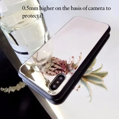 Black iPhone mirror phone case with built-in self-timer glass, compatible with iPhone 7 Plus, 8 Plus, and X models.