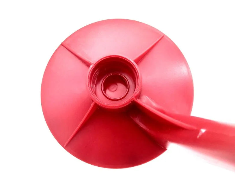 Red plastic soda dispenser attached to inverted 2-litre bottle with push-button mechanism