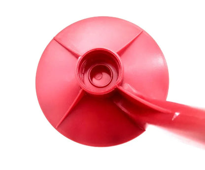 Red plastic soda dispenser attached to inverted 2-litre bottle with push-button mechanism