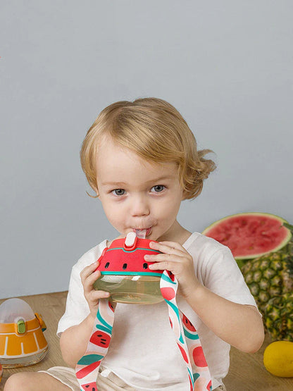 Colorful spill-proof kids water bottle with straw, featuring a shoulder strap and clear tick marks for monitoring water intake
