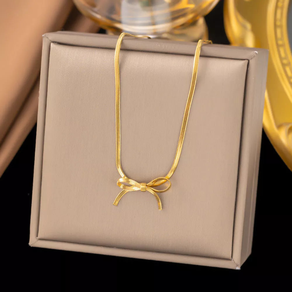 Trendy bowknot stainless steel gold plated snake chain necklace for women