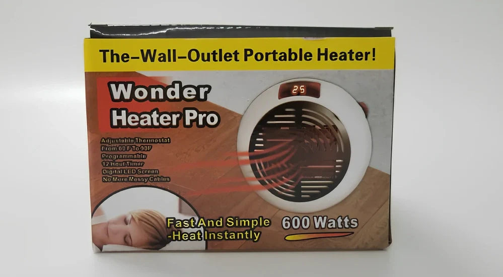 Black portable mini heater with temperature control dial showing 15-32°C range and compact design