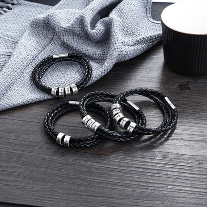 Personalized men's braided leather bracelet with stainless steel beads and custom name charm