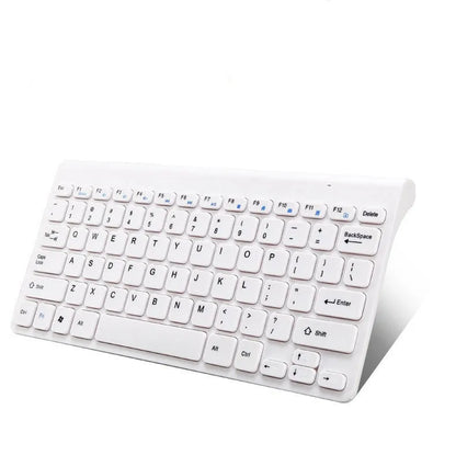 Black and white wireless keyboard and mouse set on a desk with 4G dongle
