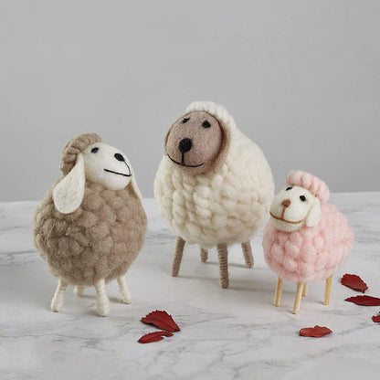Adorable plush sheep decorations in various sizes and color combinations, perfect for adding a cozy, farmhouse-inspired touch to any home.