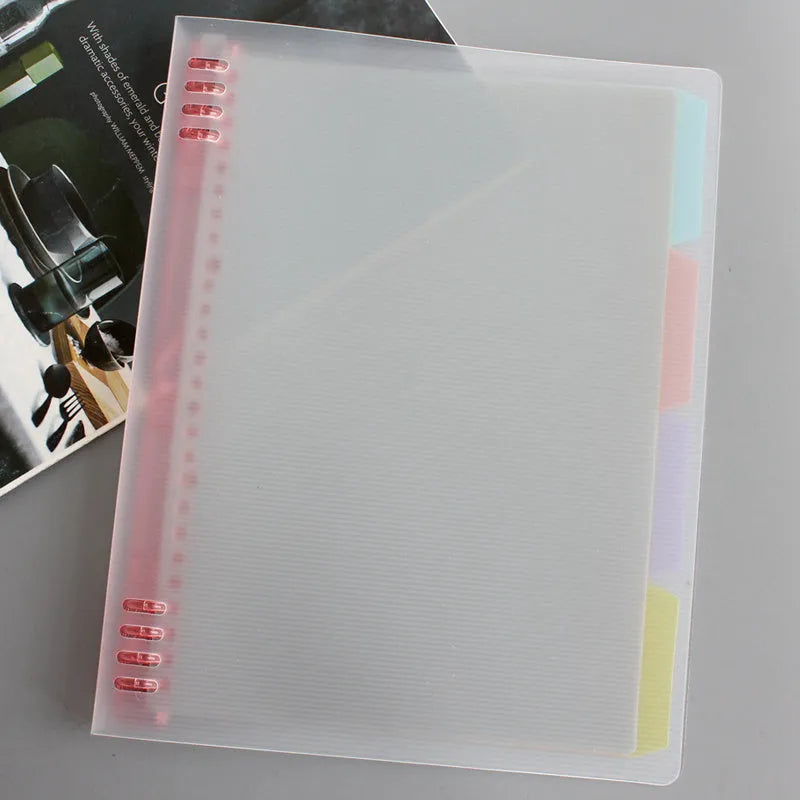 B5 loose-leaf refill pad with coloured PP cover, 40 pages, for 8-hole binders.