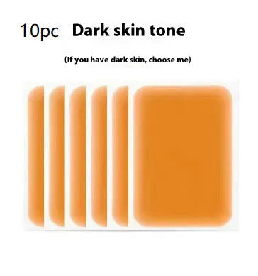 Tattoo cover patch and a 130mm long concealer brush on a table, with colour option swatches visible.