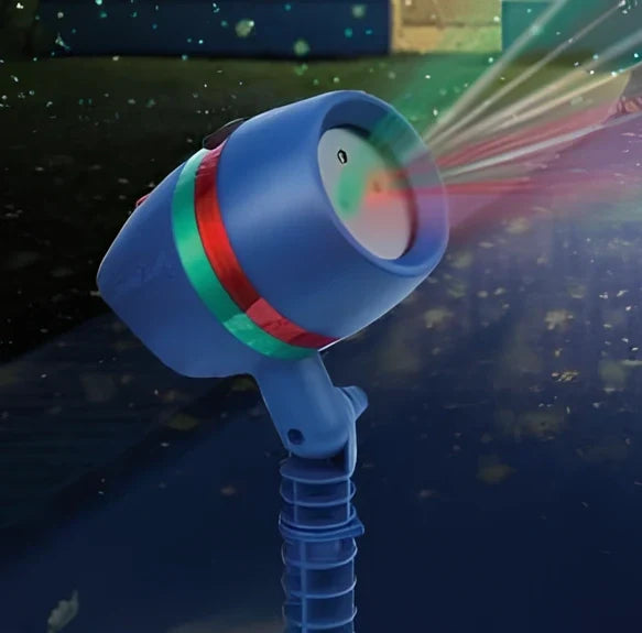Mini LED garden projection lamp showing star patterns on lawn with waterproof housing