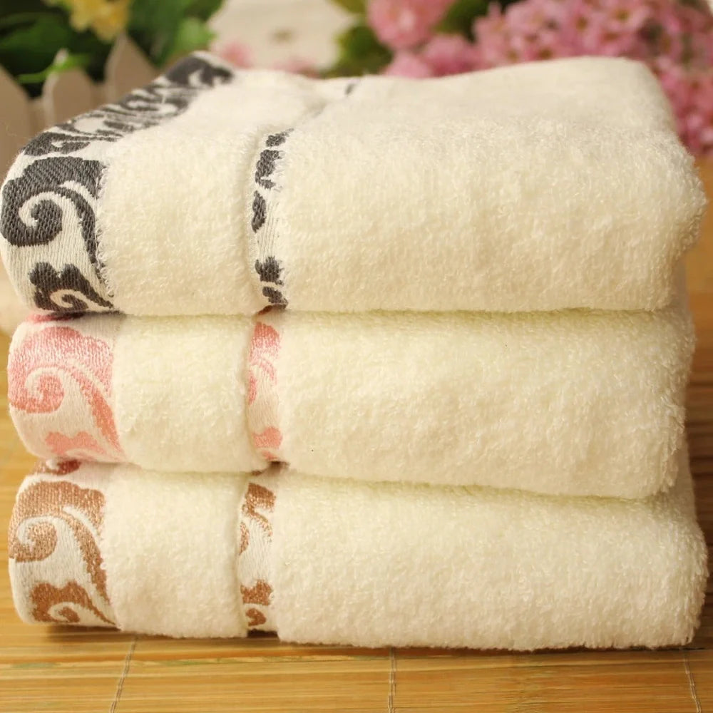 Pure cotton jacquard face towel measuring 33x73cm with textured patterns and twistless yarn construction