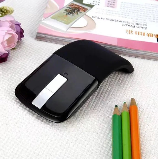 Black folding touch wireless mouse shown in open position with Bluetooth 4.0 logo