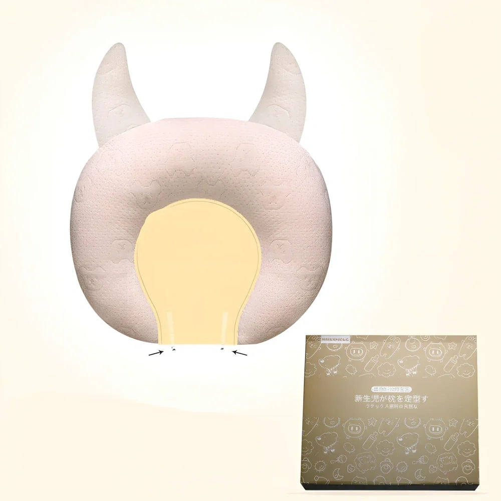 White baby pillow with latex core measuring 30x40cm for infant head support
