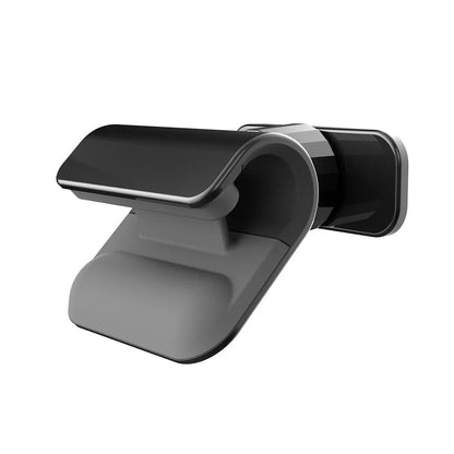 Black universal car phone holder with 360-degree rotating pivot mounted on a car air vent, holding a mobile phone.
