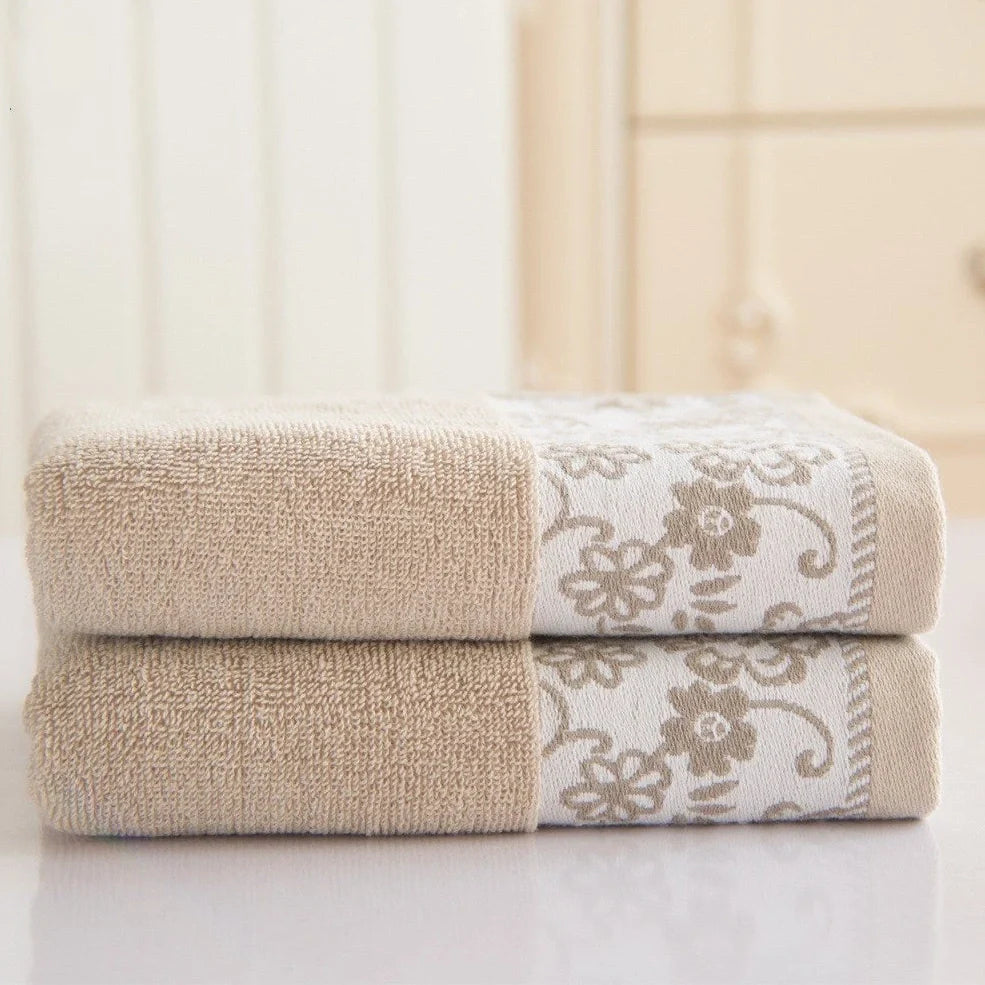 Wisteria flower jacquard cotton towel showing textured surface and 34x73 cm dimensions