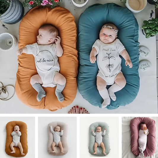 Beige portable cotton baby nest crib measuring 75 by 45 centimetres for newborn infants