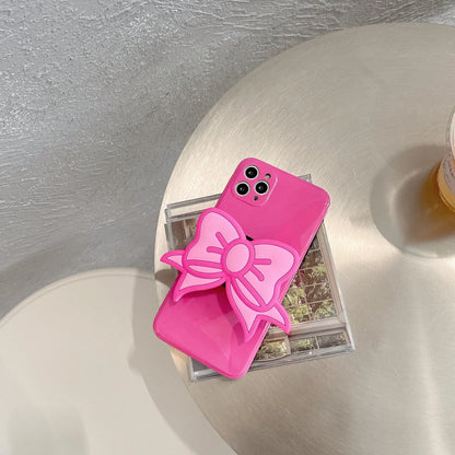 Rose red TPU iPhone case with integrated bow-shaped viewing stand