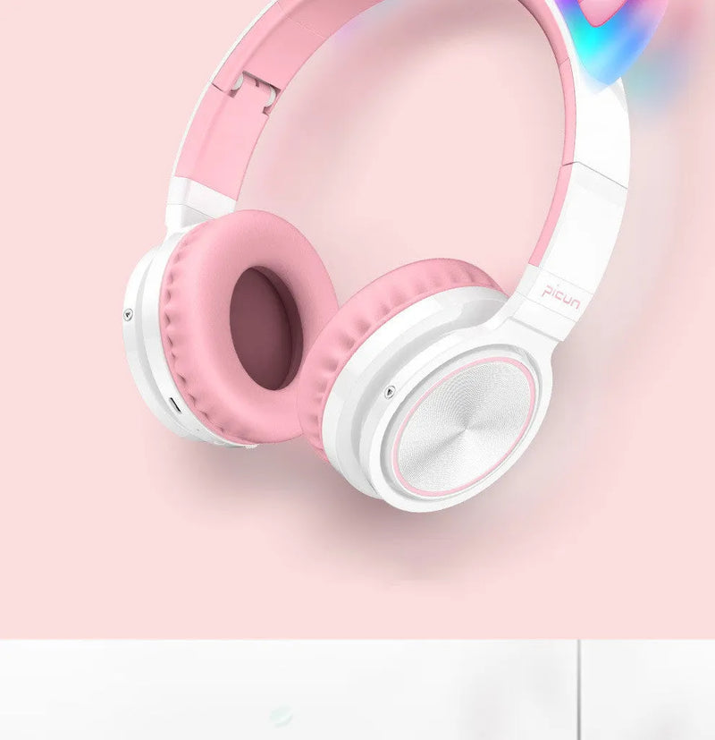 Wireless Bluetooth headset with 40mm moving coil drivers featuring 20-20000Hz frequency response, 32Ω impedance and 108dB sensitivity for general audio output in pink and white colourway with braided cable.