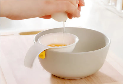 White ABS plastic egg separator with 10cm handle and 7.3cm bowl for yolk separation