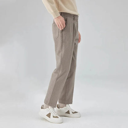 Men's straight-leg corduroy trousers in beige, black, and brown gray colours showing mid-waist and loose fit