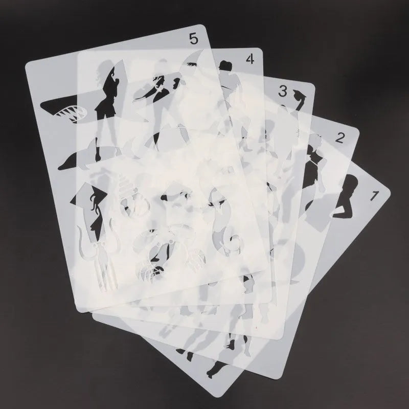 White plastic reusable stencil template with geometric patterns for DIY painting and crafts.