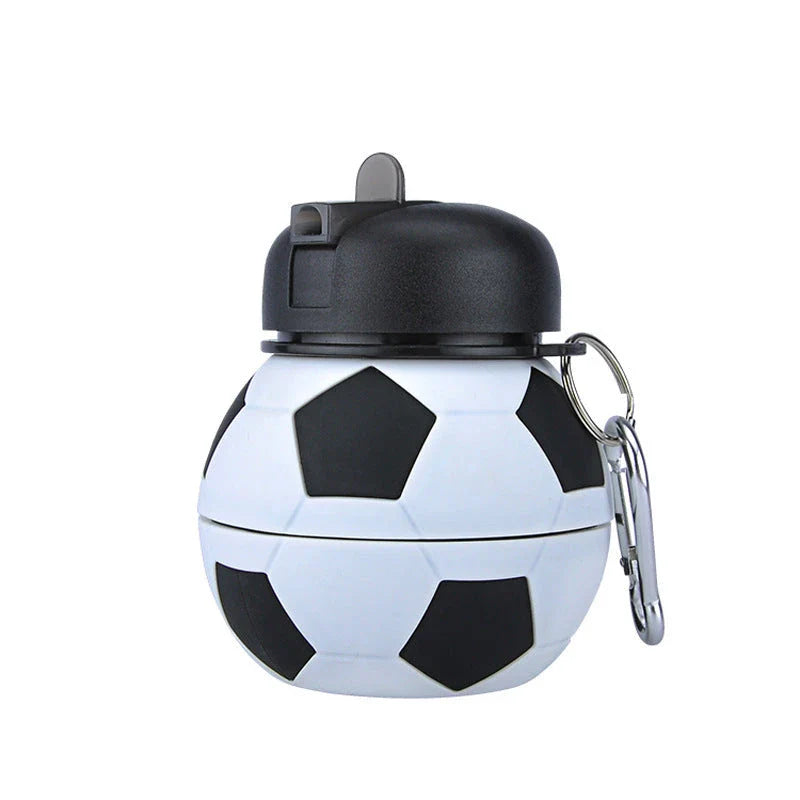 Collapsible soccer-shaped water bottle with straw, made of food-grade silicone for sports and travel hydration