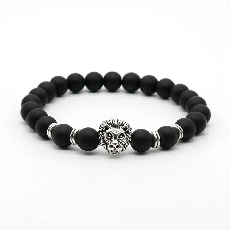 Carved stone bracelet featuring a powerful lion design, meant to enhance confidence and style.