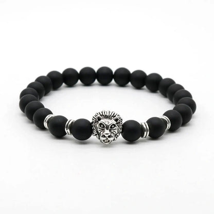 Carved stone bracelet featuring a powerful lion design, meant to enhance confidence and style.