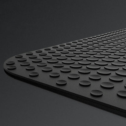 Black gaming mouse pad made of PC and rubber, weighing 285g, with stitched edges for durability