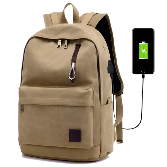 Coffee-coloured canvas backpack with USB charging port on side strap and front zipper pocket.