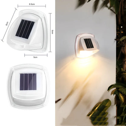 Solar garden wall lamp with waterproof housing mounted on brick wall