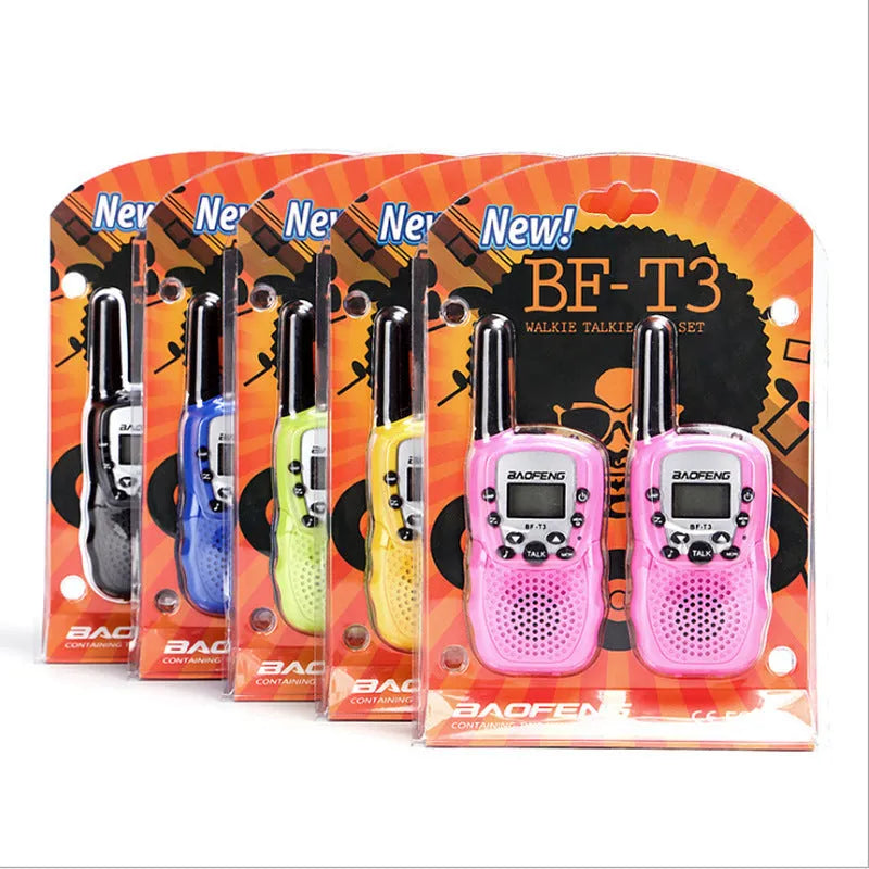 Two children's handheld walkie talkies in bright colours showing channel selector and antenna.
