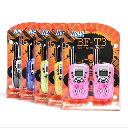 Two children's handheld walkie talkies in bright colours showing channel selector and antenna.
