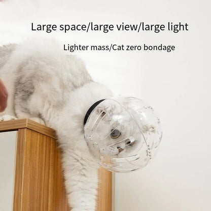 Transparent plastic cat muzzle hood with adjustable Velcro strap shown in three sizes: M, L, and XL.