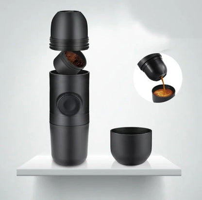 Portable espresso maker with black color, compact size, and premium stainless steel and silicone construction