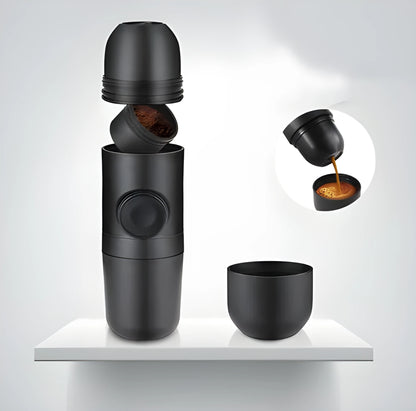 Black portable manual coffee machine with pressure gauge, 6cm wide and 17.5cm tall.