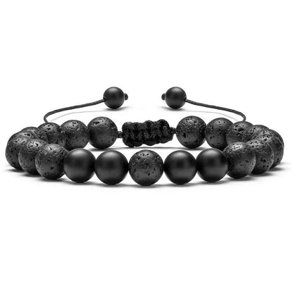 Tiger Eye and black agate geometric couple bracelets laid out as a matching set.