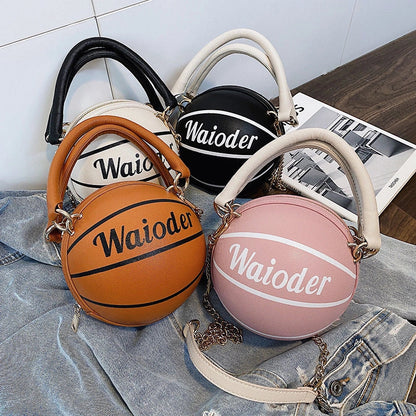 Basketball-shaped handbag with adjustable shoulder strap in pink, white, black, and brown