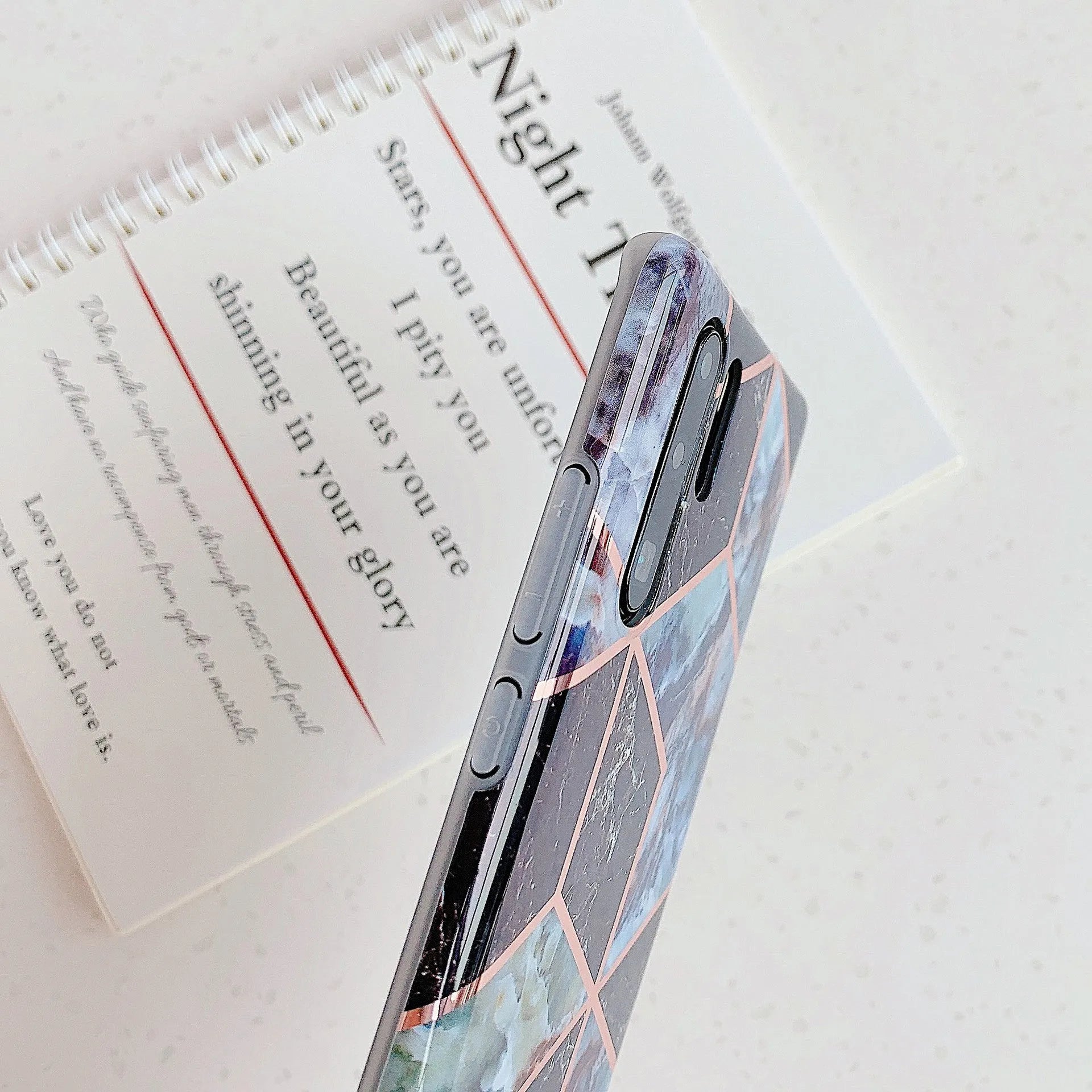 Electroplated marble mobile phone case in various colours for Huawei and Samsung models, showing slim TPU back cover design