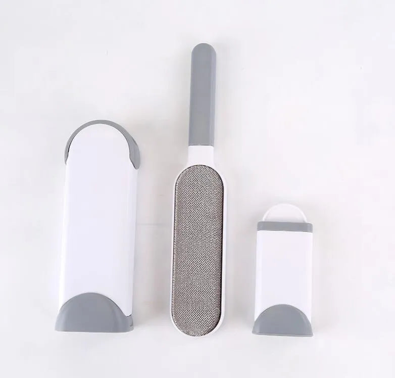 Blue reusable pet hair removal comb with sticky brush and self-cleaning base for sofas.