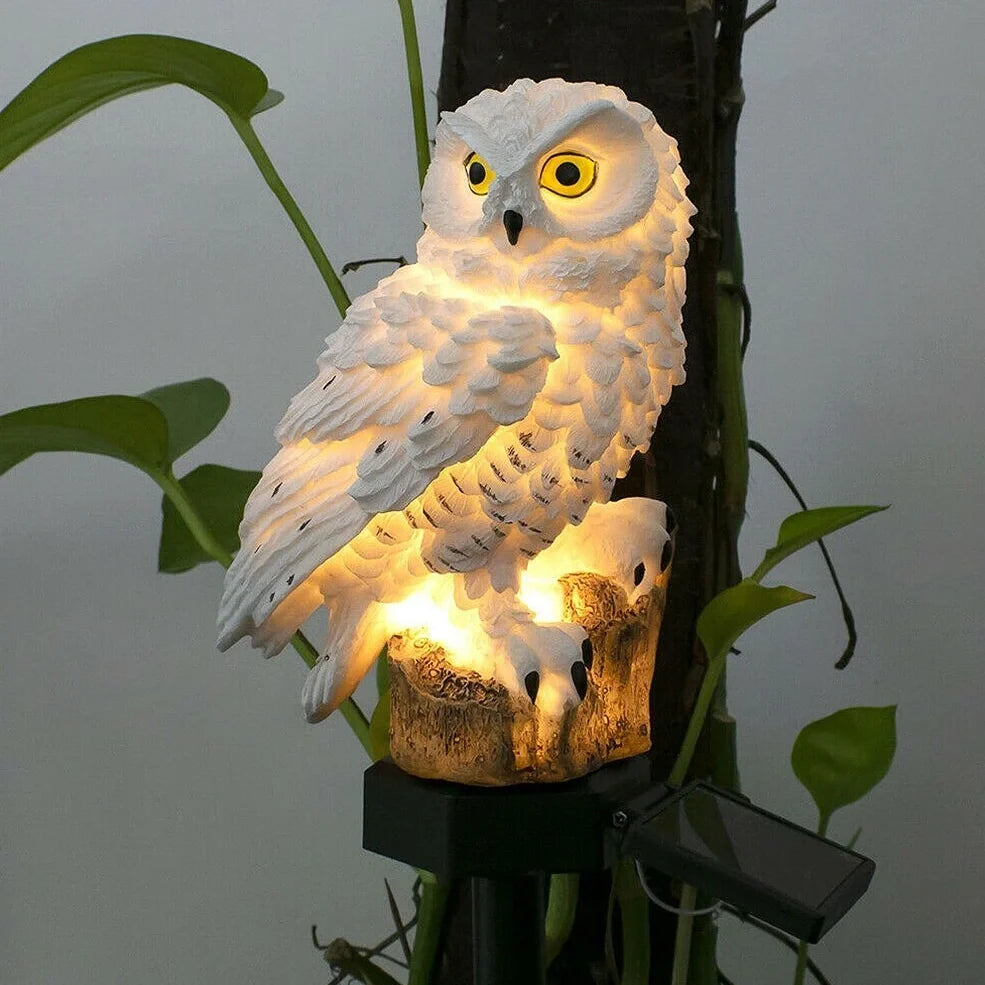 Solar owl garden light with realistic design standing 45cm tall, featuring LED illumination and solar panel