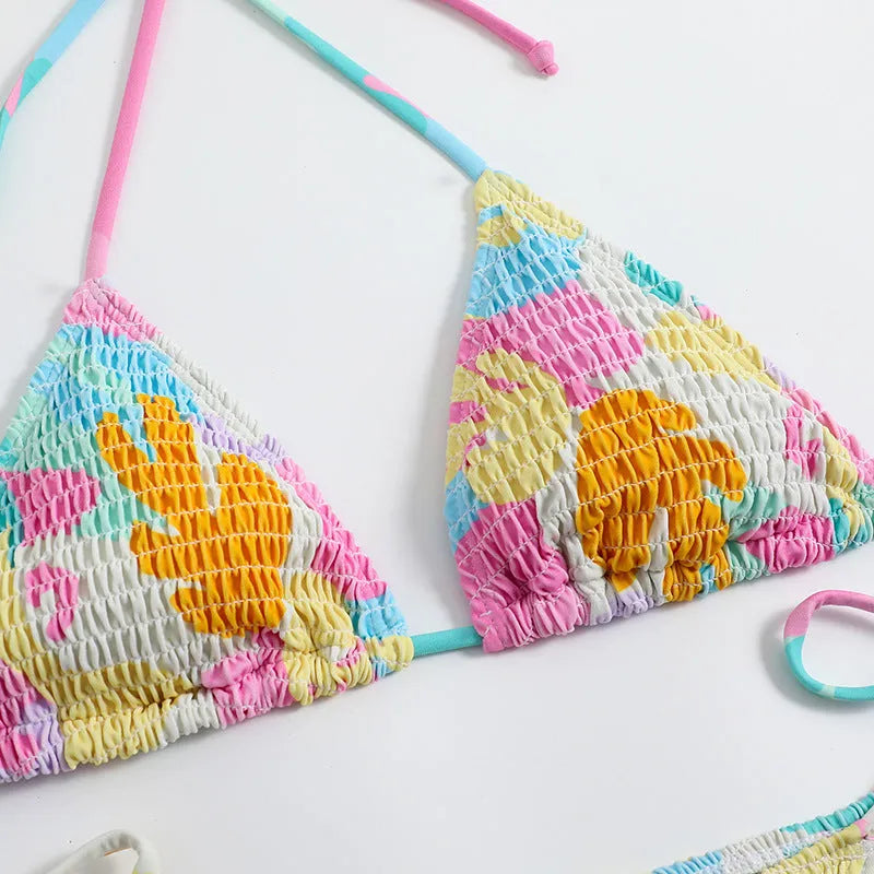 Women's triangle bag bikini swimsuit with floral gradient print and smocking craft detail
