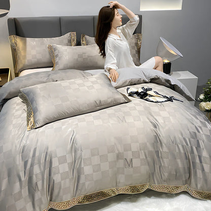 Cotton jacquard bed set with embroidery detailing and deep pocket fitted sheets in Advanced Grey colour