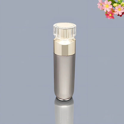 Acrylic cosmetics bottles in champagne gold and brushed white with vacuum sealing, various sizes from 5g to 120ml