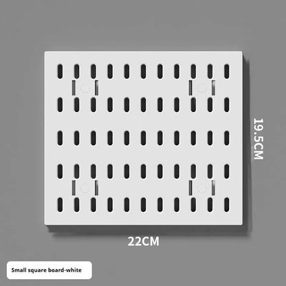 White and black punch-free wall storage rack with multiple size options for cable organisation