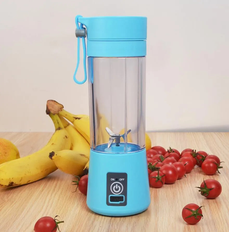 Pink portable USB electric fruit juicer blender cup with stainless steel blade and carry handle.