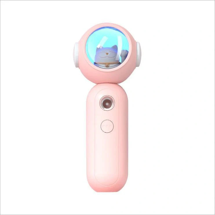 Handheld Nano Spray Steamer in cat pink, cat white, and alien red for portable skin hydration
