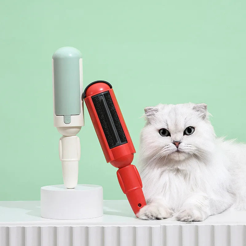 Reusable pet hair remover roller with nylon brush and non-slip BPA-free plastic handle in red and black colours.